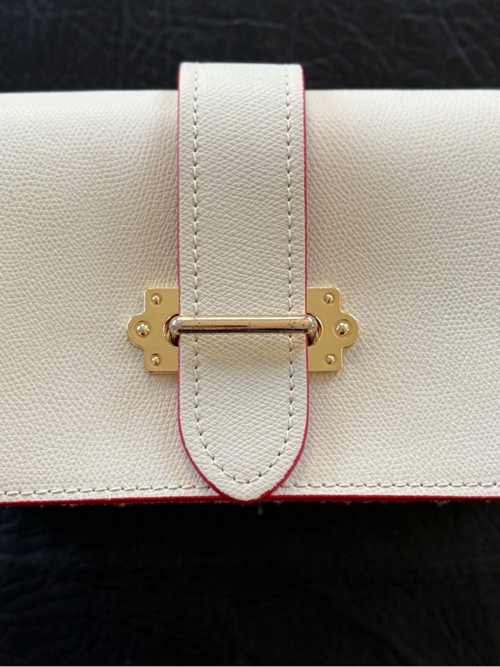 Elegant Cream Leather Crossbody Bag with Gold Hardware